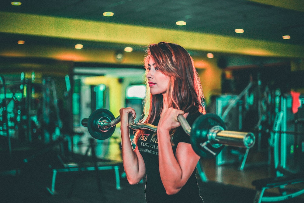 Woman in a gym Weight Maintenance during the Holidays