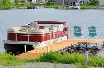 Pontoon boat tied to a deck